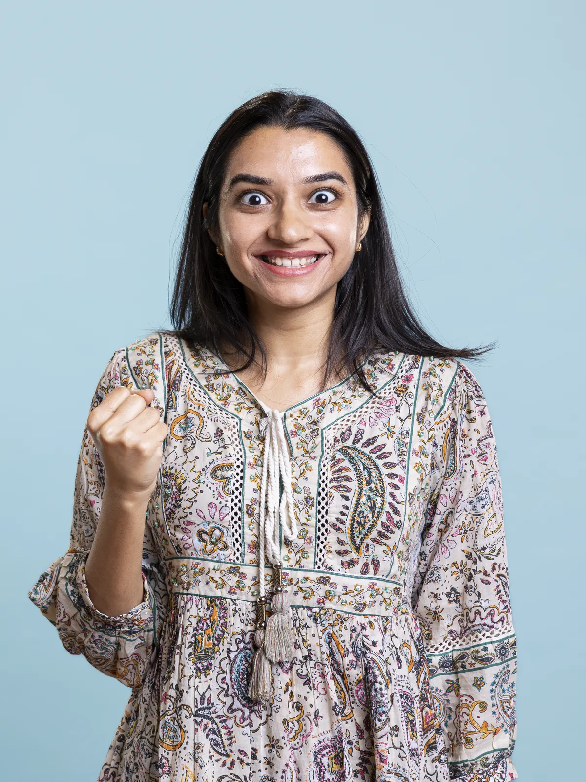 Woman celebrating her new smile